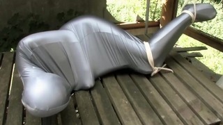 Bondaged And Cocooned Slave Girl Escapes From The Mystery Backyard – Full Spandex Encasement Fetish