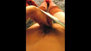 Disabled girl in lacy thigh highs pleases self with fingers and vibrator
