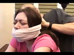 Bound and tape gagged slut gets fucked on the table