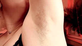 Under her armpits, taking every command